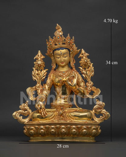 White Tara Statue handmade in Nepal with seven eyes and gold fire gilded copper finish