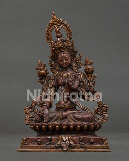 White Tara statue front view oxidized copper Buddhist deity from Nepal.