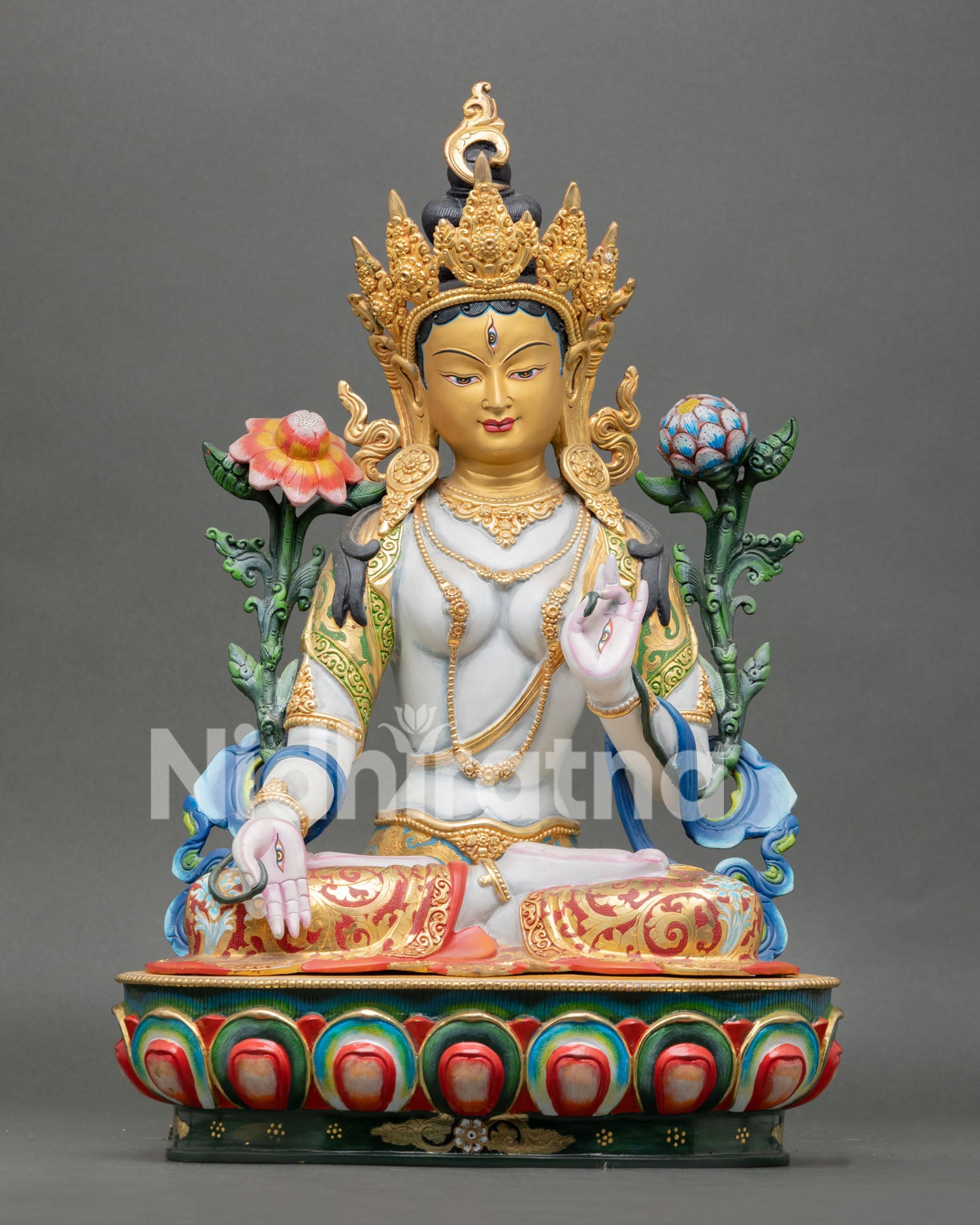 white tara statue front view with gold gilding and multicolor lotus seat