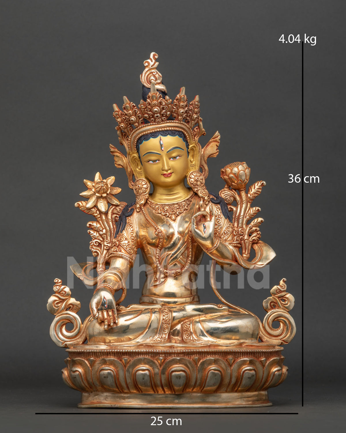 White Tara statue handcrafted by Newari artist from Patan Nepal with 24K gold painted face and gold fire gilding.