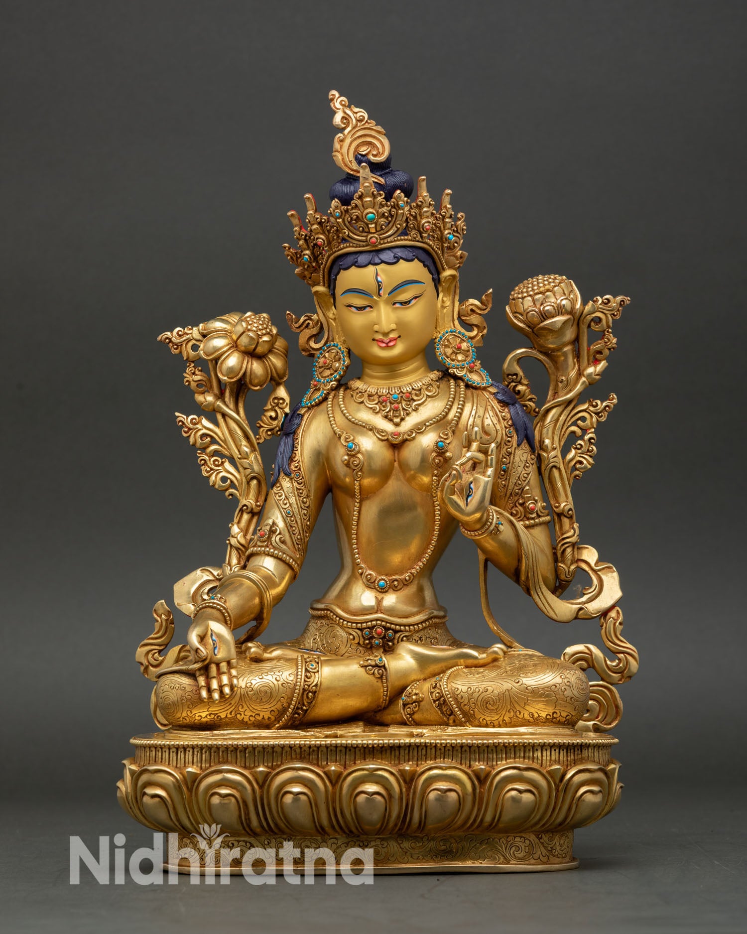 White Tara statue handcrafted in Nepal, 24K gold detailing and compassionate serene expression.