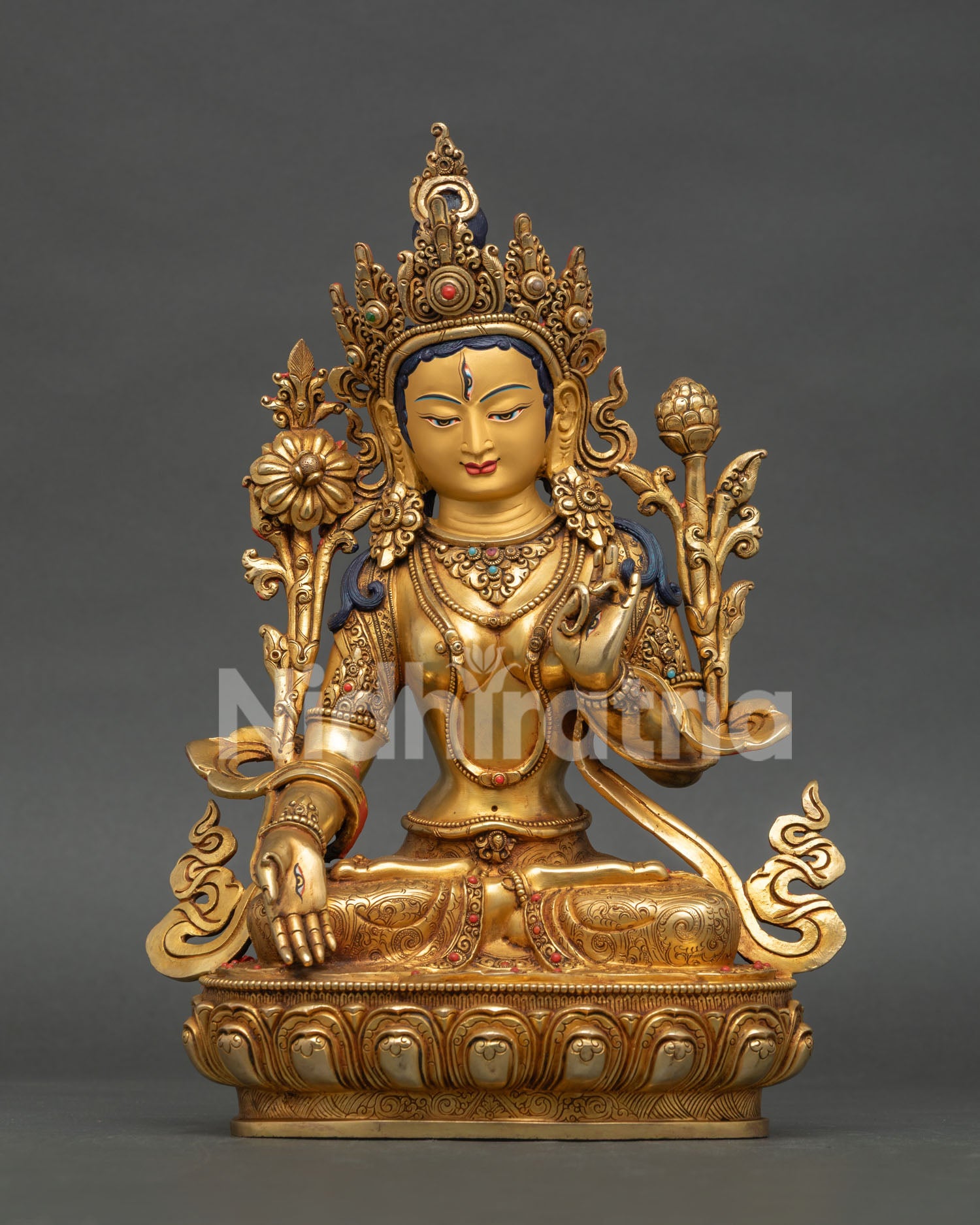 White Tara statue, handcrafted in Nepal with gold finish and semi precious stone adornments