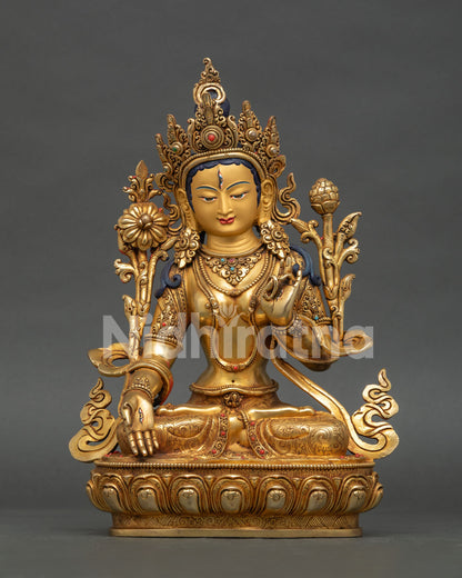 White Tara statue, handcrafted in Nepal with gold finish and semi precious stone adornments