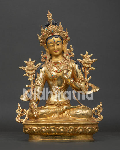 White Tara Statue handcrafted in Nepal with gold fire gilded finish and lotus pedestal.