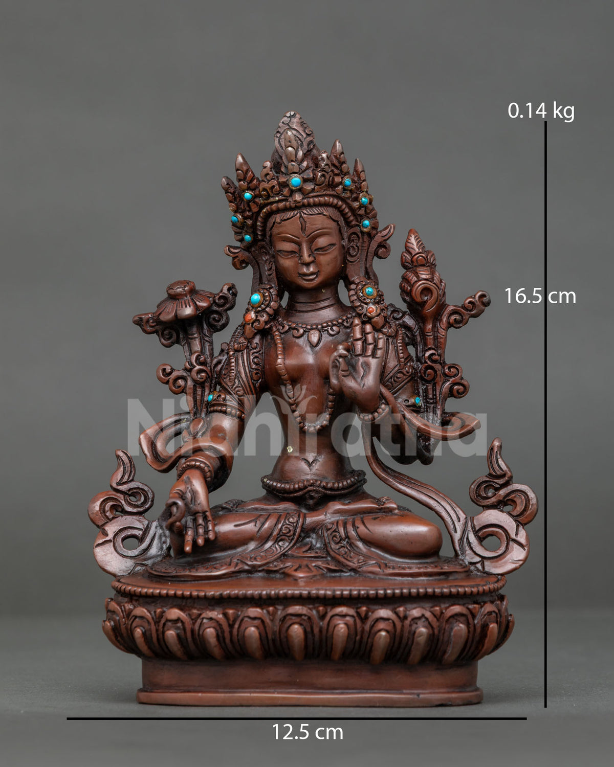 White tara statue handcrafted in patan nepal with seven eyes and oxidized copper finish.