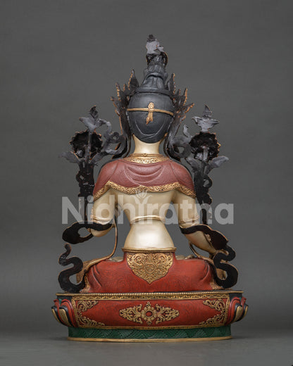 White Tara statue revealing exceptional copperwork, vibrant colors, and sacred Buddhist symbolism.