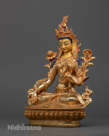 White Tara statue seated on hand carved lotus pedestal.