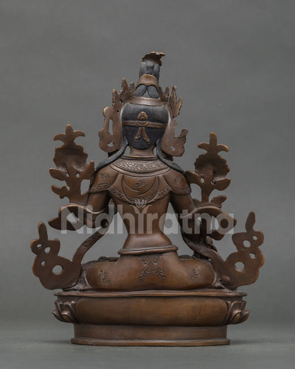 White Tara statue seven eyes healing longevity and compassion.