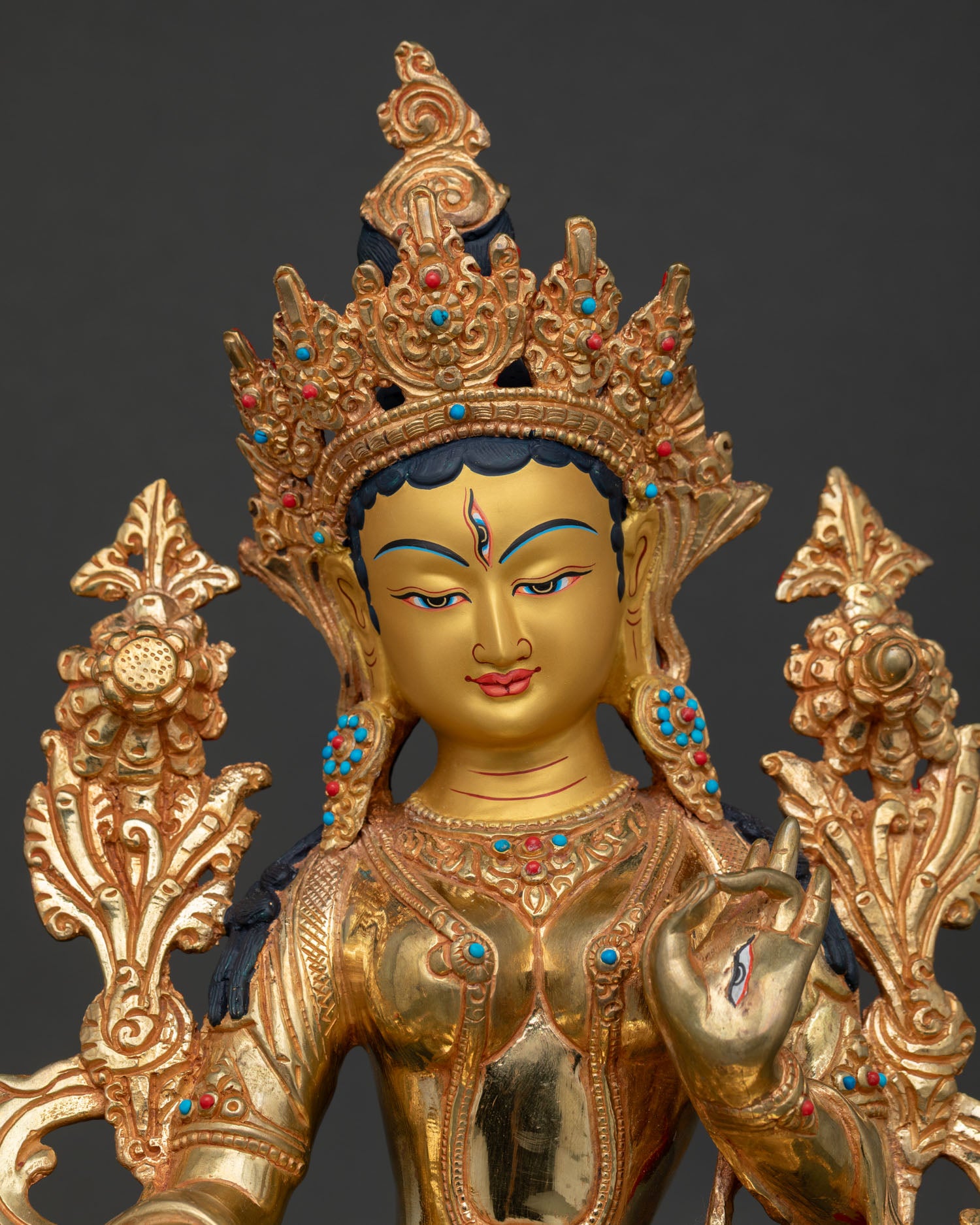 White Tara Statue, showing seven eyes and gold-painted face