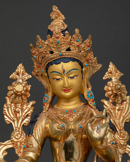 White Tara Statue, showing seven eyes and gold-painted face