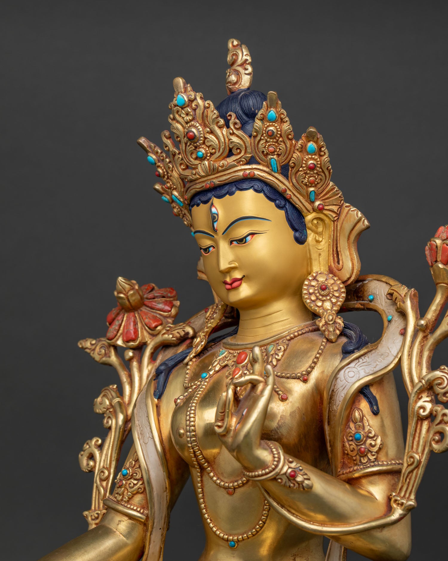 White Tara Statue Side Detail Showcasing Turquoise Inlays and Intricate Repoussé Craftsmanship