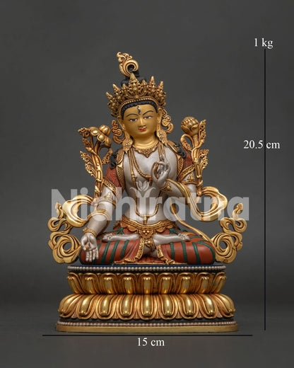 White Tara Statue with Seven Eyes handcrafted in Nepal with 24K gold gilding and copper casting shown from the front