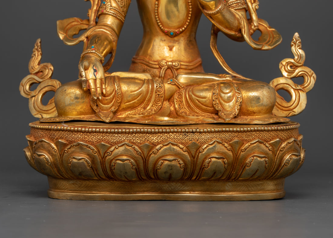 crossed leg of gold plated white tara statue