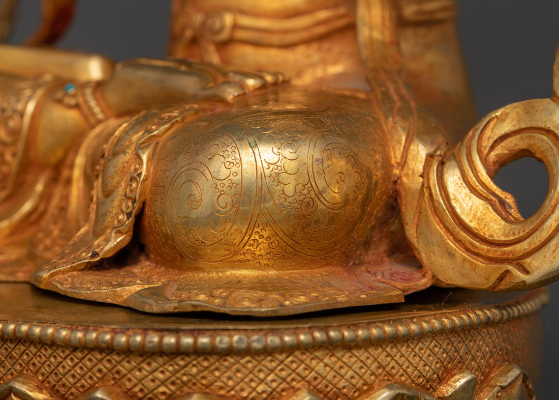 leg of gold plated white tara statue