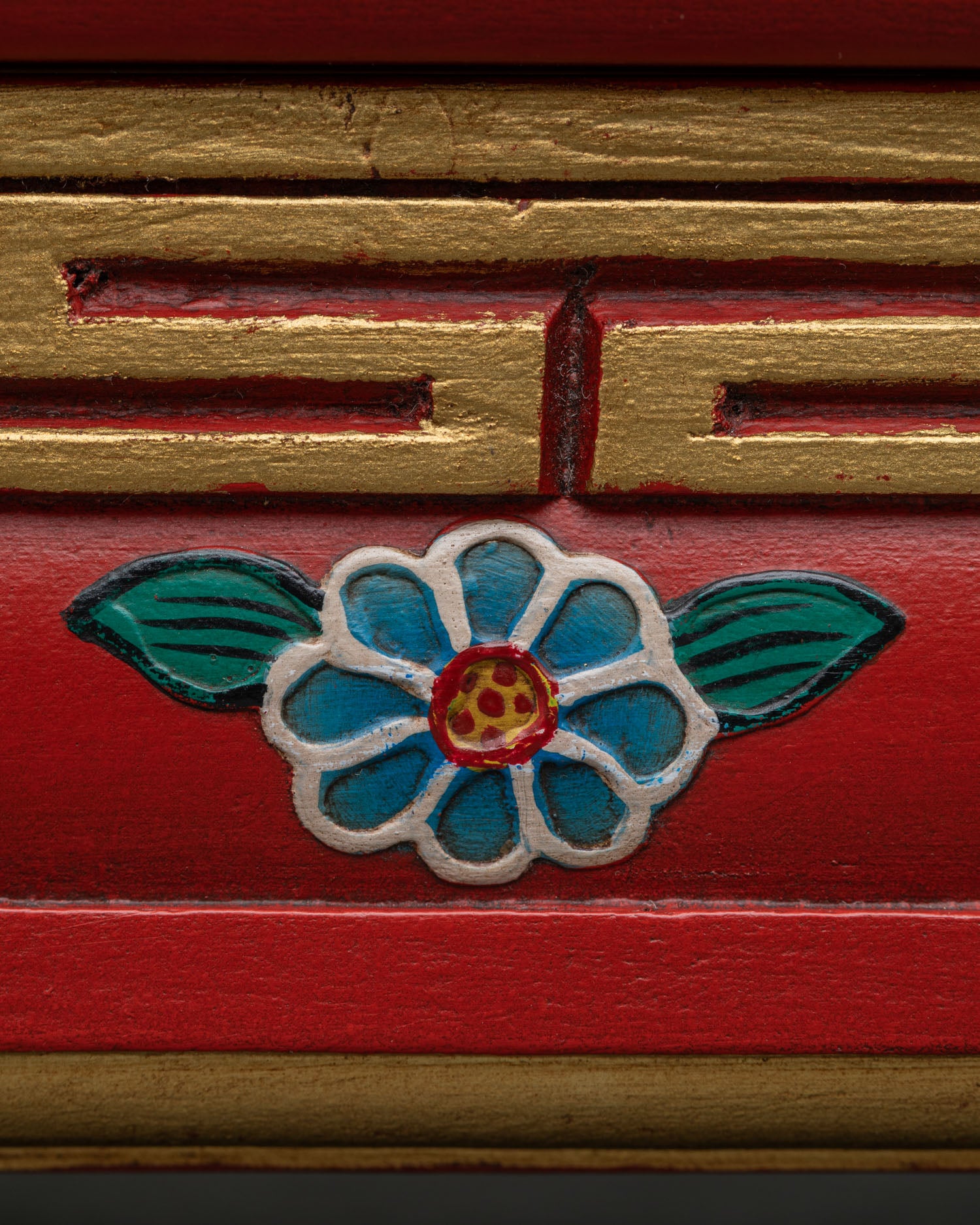Wooden Buddhist incense burner with intricate Newari floral artwork