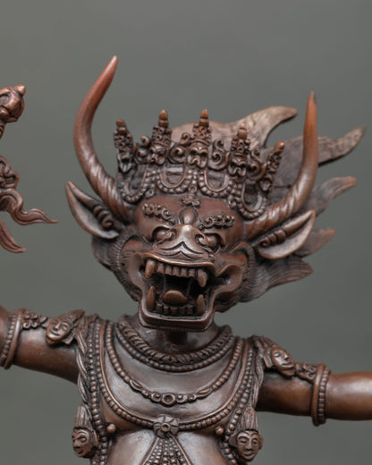 Yamantaka close up fierce expression with consort copper statue oxidized finish showing detailed craftsmanship and spiritual symbolism.