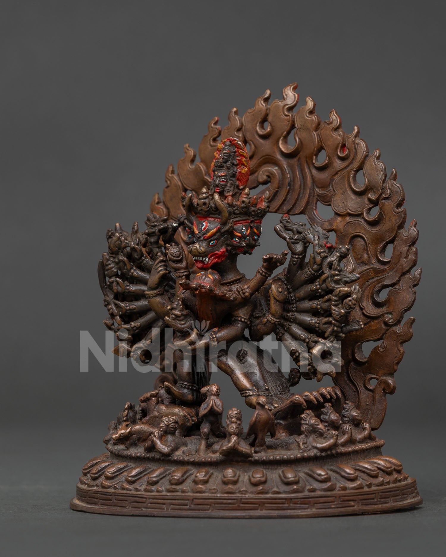 Yamantaka statue showing symbolic figures and chemically oxidized copper.