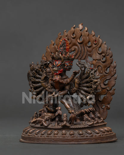Yamantaka statue showing symbolic figures and chemically oxidized copper.