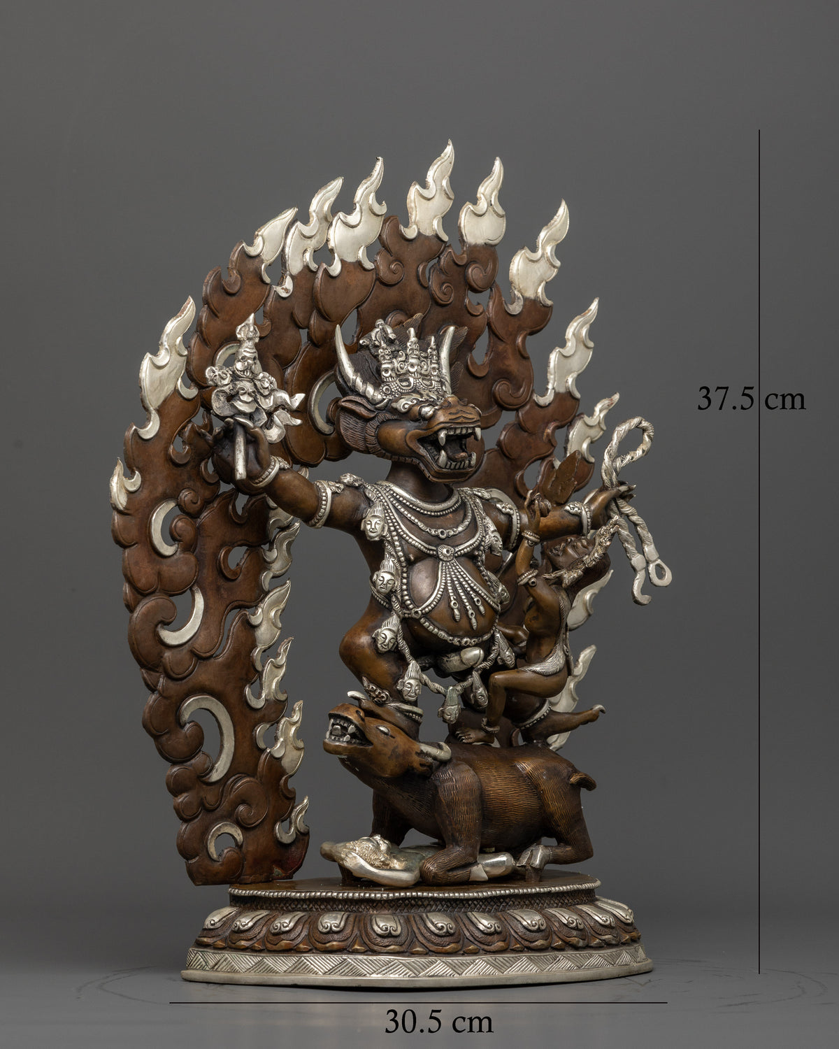Yamantaka statue with wrathful Manjushri form and consort in dynamic union.