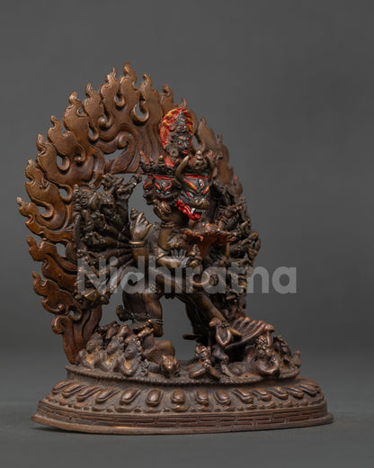Yamantaka with Vajravetali standing on lotus pedestal with blazing halo.
