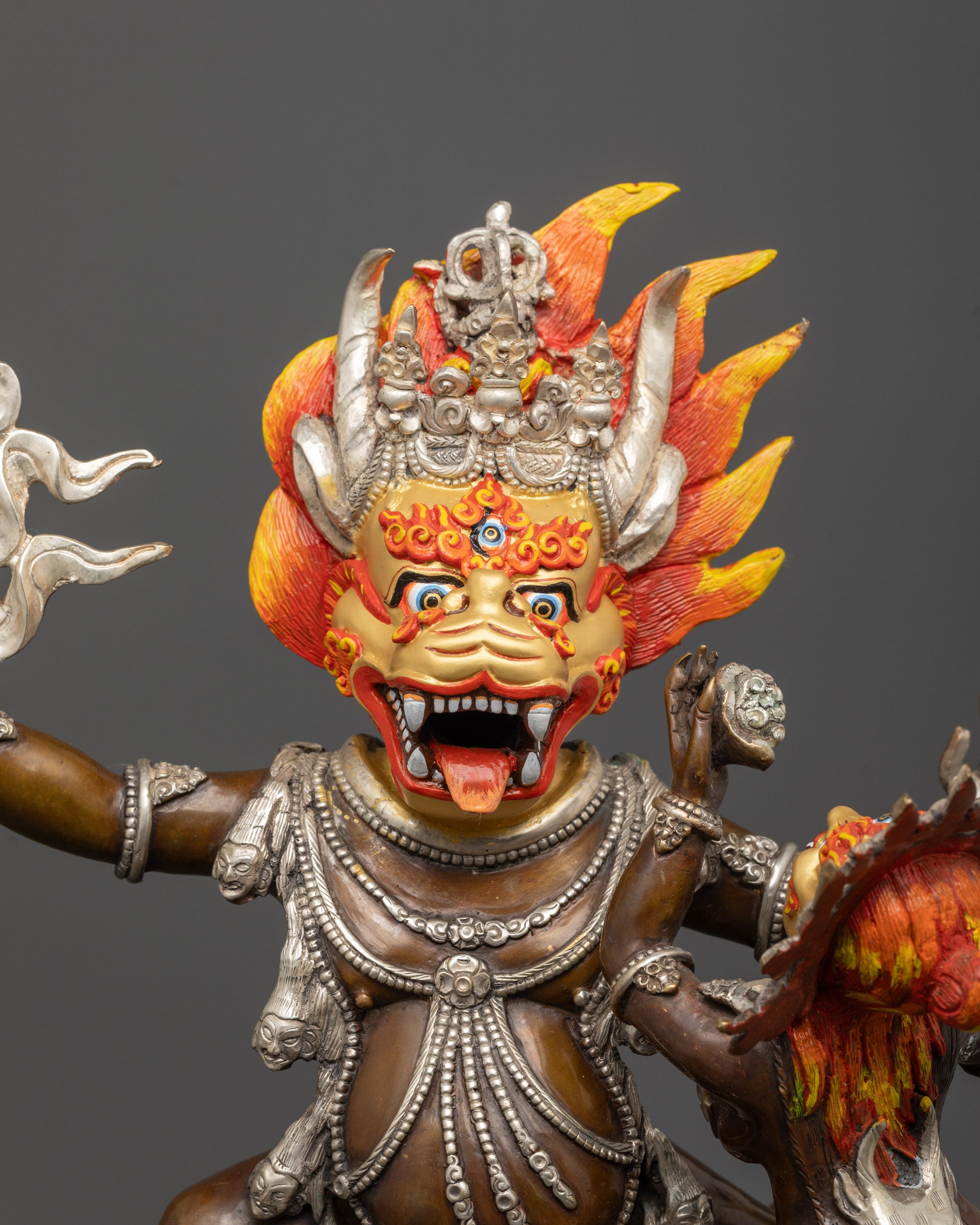 yamantaka consort statue close-up showing oxidized copper details and fierce expression