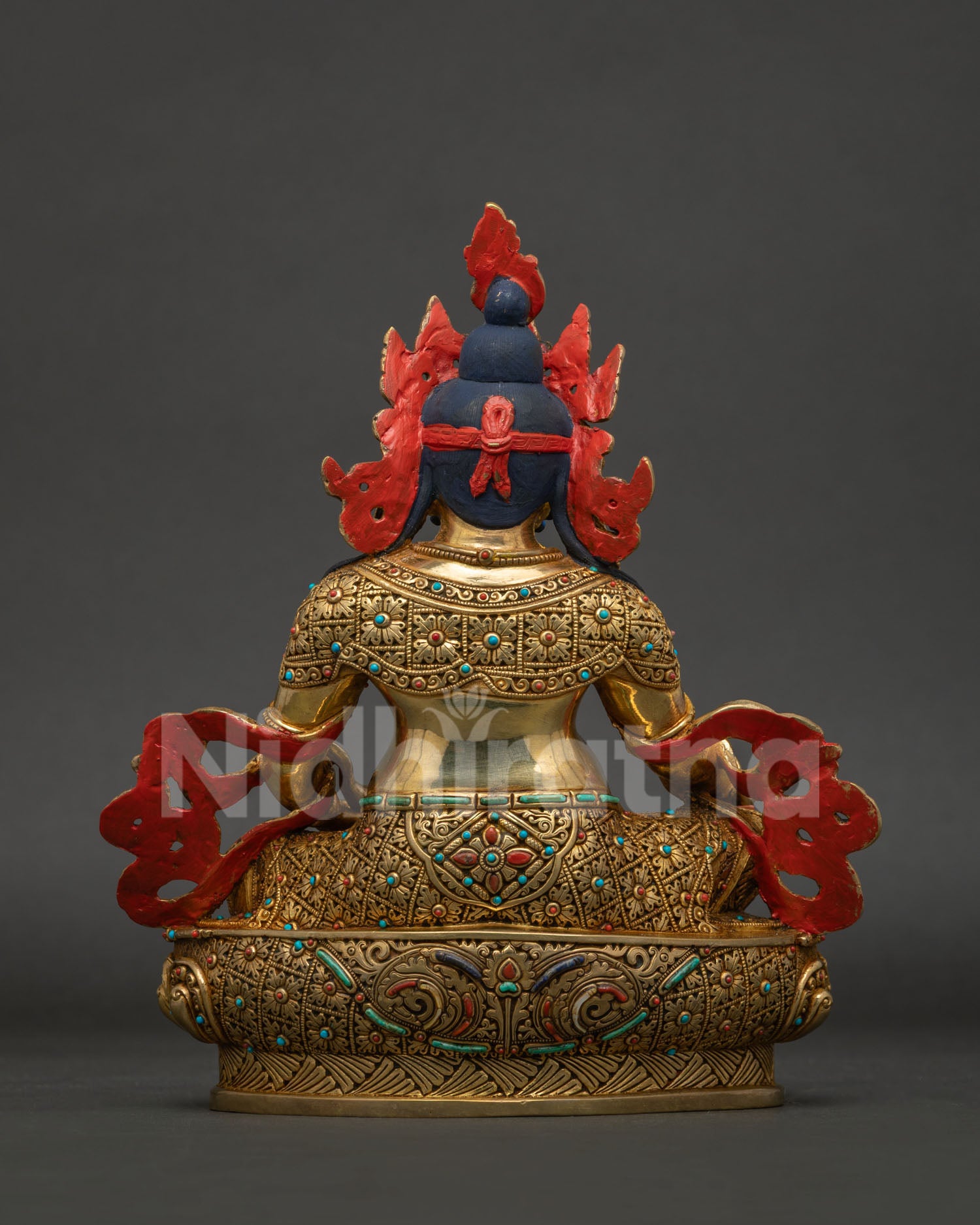 Yellow Dzambhala Statue back view showing handcrafted Nepalese copper sculpture