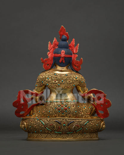 Yellow Dzambhala Statue back view showing handcrafted Nepalese copper sculpture