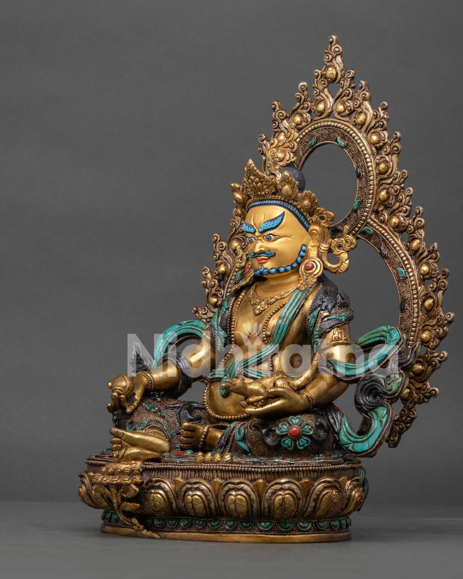 Yellow Dzambhala Statue left view side showing gold gilded robes and filigree details