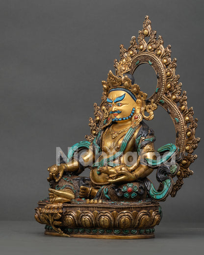 Yellow Dzambhala Statue left view side showing gold gilded robes and filigree details