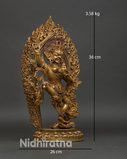 Yeshe Walmo statue side view dynamic one foot stance lotus pedestal tiger skin Himalayan wrathful protector goddess sculpture Nepal