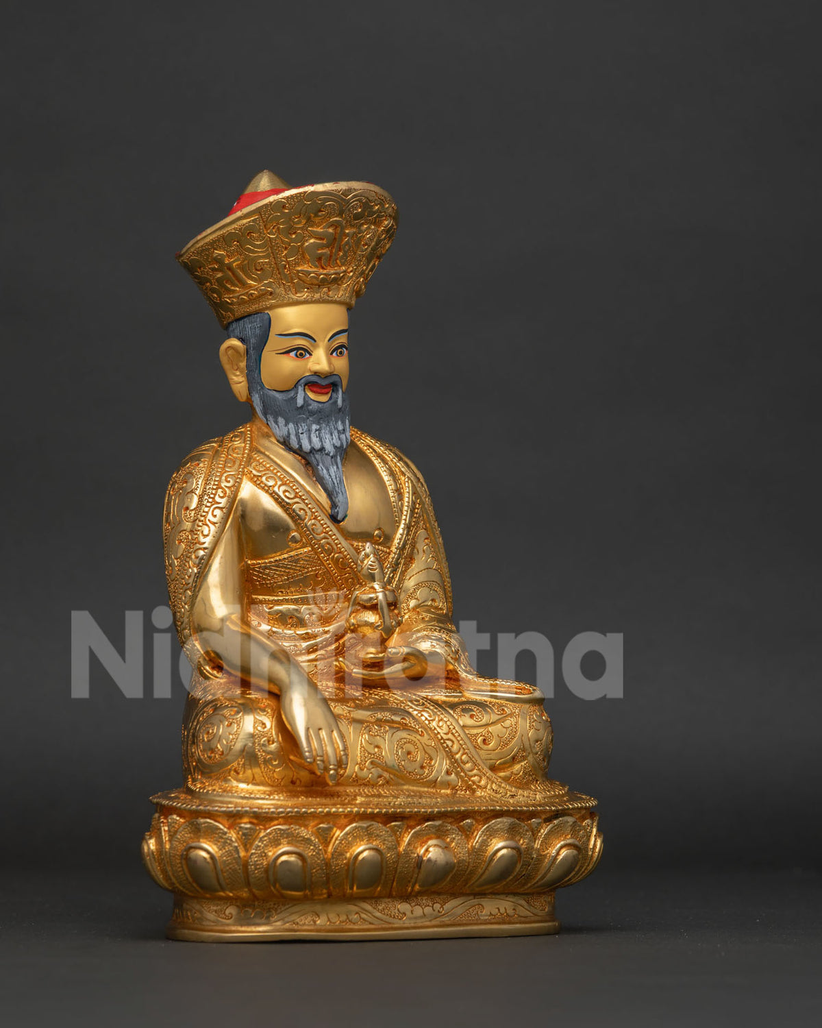 Zhabdrung Rinpoche statue earth touching mudra ritual vase lotus seat.